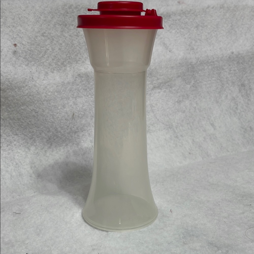 Tupperware salt or pepper shaker. New without tags.
